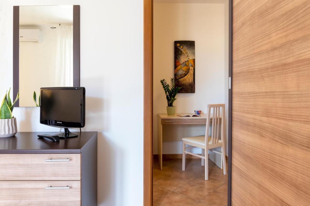 Le Terrazze Apartments Алгеро Екстериор снимка